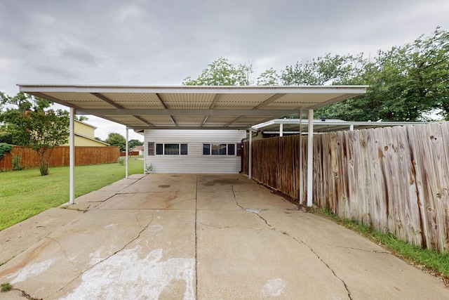 1803 Travis St, Garland, TX 75042 - view of parking / parking lot featuring a carport and driveway