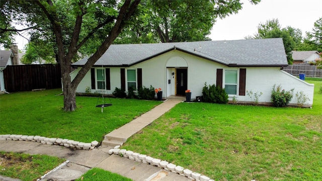 1803 Travis St, Garland, TX 75042 - view of front of home with roof with shingles and brick siding