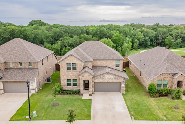 485 Canyon Falls Ave, Princeton, TX 75407 - view of subject property with a heavily wooded area