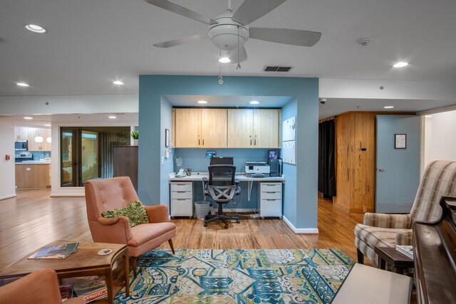 921 NW 9th St, Grand Prairie, TX 75050 - office featuring light wood finished floors, built in study area, recessed lighting, a ceiling fan, and baseboards