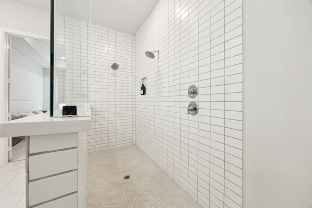 2560 Liverpool Ln, Carrollton, TX 75010 - bathroom with tiled shower and tile patterned floors