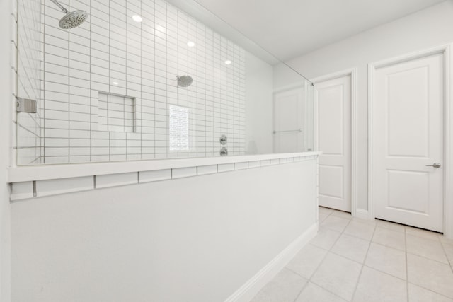2560 Liverpool Ln, Carrollton, TX 75010 - hall featuring light tile patterned floors and baseboards
