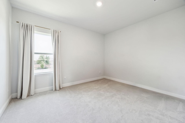 2560 Liverpool Ln, Carrollton, TX 75010 - carpeted empty room with baseboards