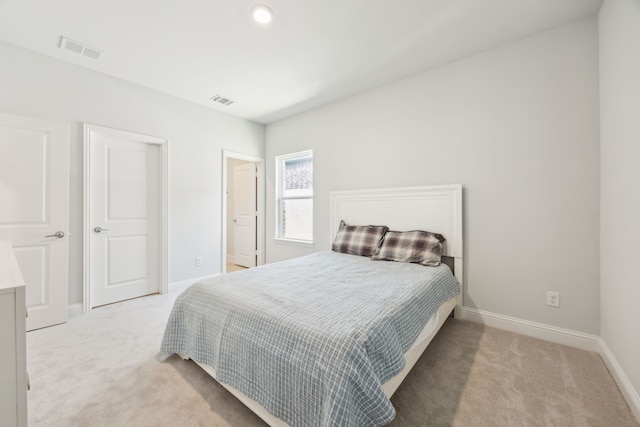 2560 Liverpool Ln, Carrollton, TX 75010 - bedroom with light carpet and baseboards
