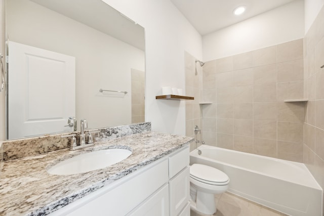 2560 Liverpool Ln, Carrollton, TX 75010 - full bathroom with vanity, washtub / shower combination, and toilet
