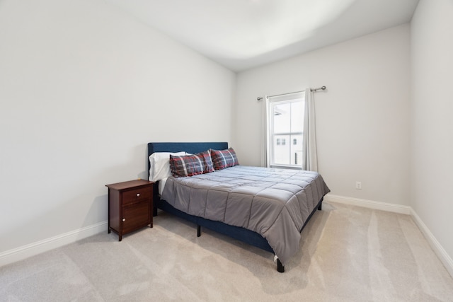 2560 Liverpool Ln, Carrollton, TX 75010 - bedroom with light colored carpet and baseboards