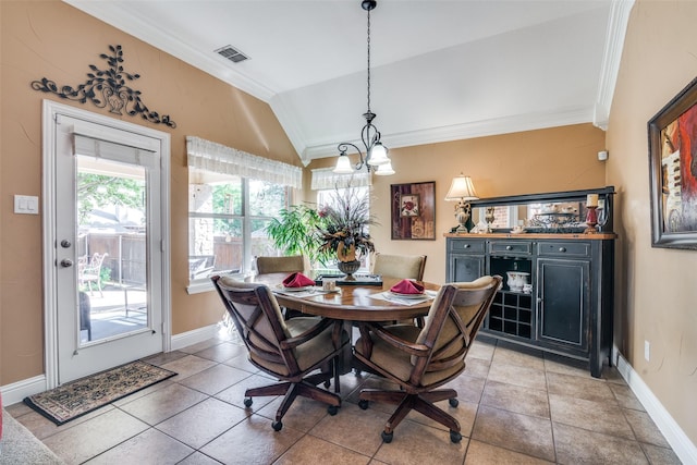2345 Falls View Dr, Rockwall, TX 75087 - dining space featuring crown molding, lofted ceiling, baseboards, a chandelier, and light tile patterned flooring