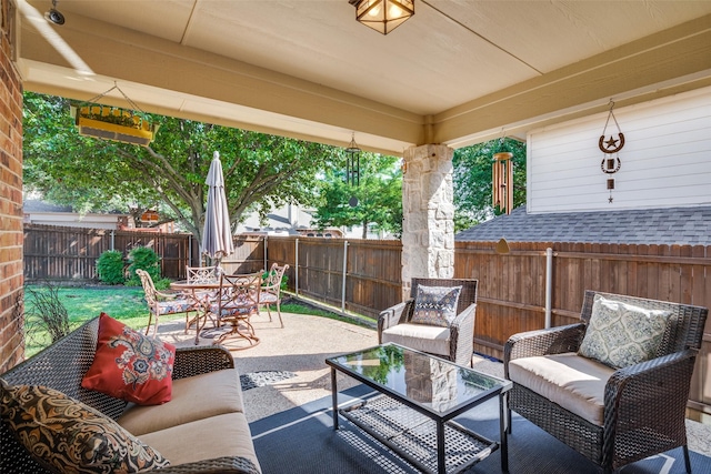 2345 Falls View Dr, Rockwall, TX 75087 - fenced backyard featuring an outdoor hangout area, a patio area, and outdoor dining area