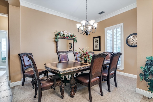 2345 Falls View Dr, Rockwall, TX 75087 - dining area featuring a chandelier, crown molding, and baseboards