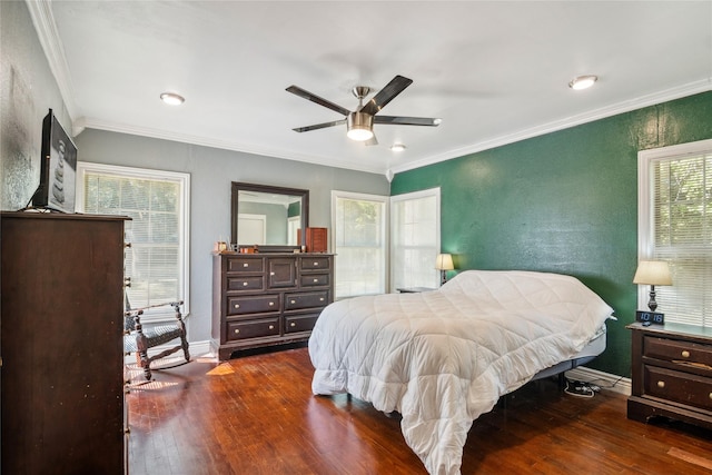 821 Columbia St, Beverly Hills, TX 76711 - bedroom with dark wood finished floors, ornamental molding, baseboards, a ceiling fan, and recessed lighting