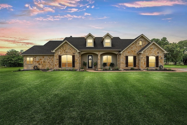 824 Lakeland Park Cir, Mart, TX 76664 - view of front of property featuring stone siding, a front lawn, and roof with shingles