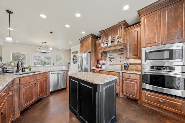 824 Lakeland Park Cir, Mart, TX 76664 - kitchen featuring appliances with stainless steel finishes, tasteful backsplash, recessed lighting, light stone counters, and decorative light fixtures