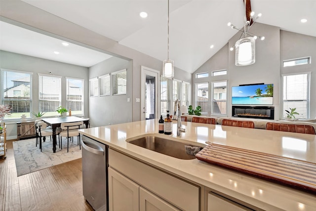 3580 Spruce Hills St, Frisco, TX 75033 - kitchen with a sink, light countertops, dishwasher, pendant lighting, and recessed lighting