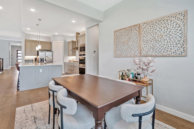 3580 Spruce Hills St, Frisco, TX 75033 - dining space with light wood-type flooring, recessed lighting, and baseboards