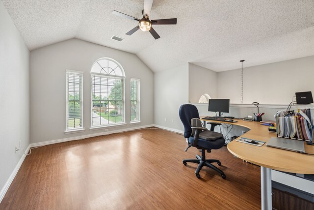 4433 Buchanan Dr, Plano, TX 75024 - office featuring ceiling fan, a textured ceiling, wood finished floors, vaulted ceiling, and baseboards