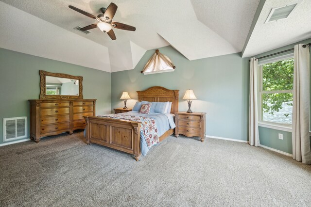 4433 Buchanan Dr, Plano, TX 75024 - bedroom featuring carpet floors, vaulted ceiling, baseboards, ceiling fan, and a textured ceiling