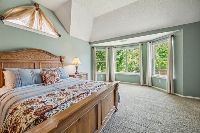 4433 Buchanan Dr, Plano, TX 75024 - bedroom featuring light colored carpet, lofted ceiling, a textured ceiling, and baseboards