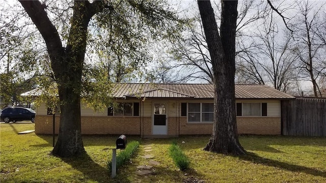 1100 8th St, Cooper, TX 75432 - single story home featuring brick siding and metal roof