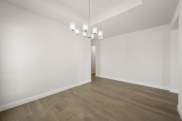 6013 Valley View Dr, Joshua, TX 76058 - empty room with a chandelier, dark wood-style flooring, and baseboards