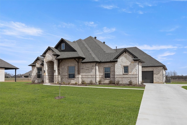 6013 Valley View Dr, Joshua, TX 76058 - french country home featuring brick siding, a shingled roof, concrete driveway, a front yard, and an attached garage