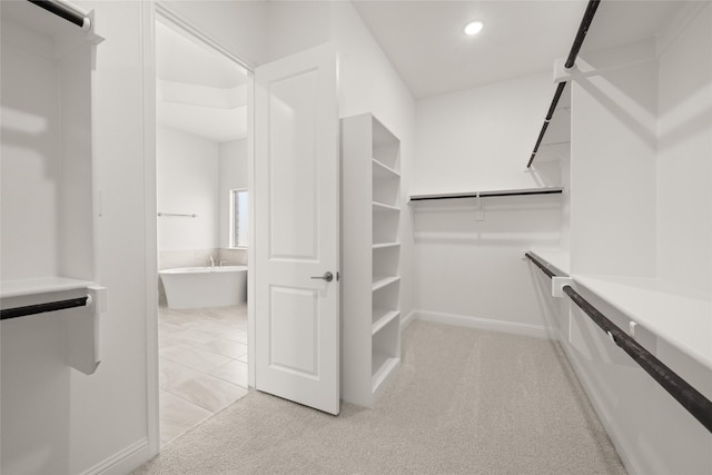 6013 Valley View Dr, Joshua, TX 76058 - walk in closet featuring light colored carpet