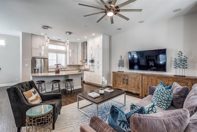 731 Spanish Oaks Pl, Dallas, TX 75204 - living area with dark wood-type flooring, healthy amount of natural light, ceiling fan, baseboards, and recessed lighting