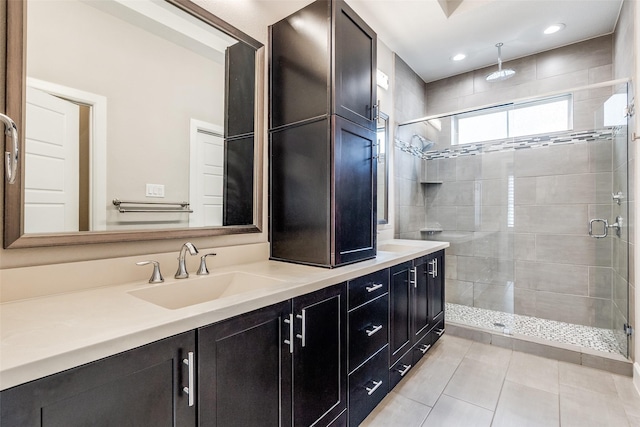 731 Spanish Oaks Pl, Dallas, TX 75204 - bathroom with double vanity, a shower stall, and tile patterned floors
