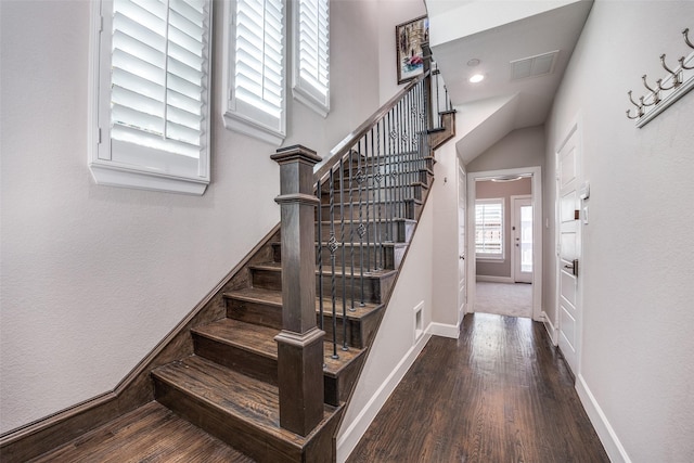 731 Spanish Oaks Pl, Dallas, TX 75204 - staircase featuring wood finished floors and baseboards