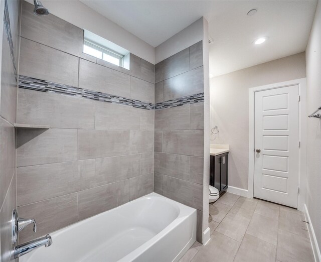 731 Spanish Oaks Pl, Dallas, TX 75204 - bathroom with toilet,  shower combination, baseboards, and tile patterned flooring