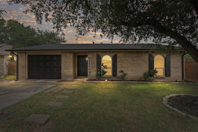 3154 Abbey Rd, Carrollton, TX 75007 - single story home with driveway, a garage, and brick siding