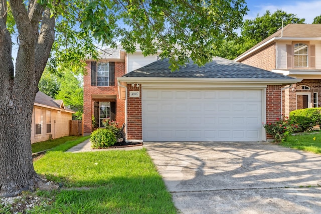4916 Lodgepole Ln, Fort Worth, TX 76137 - traditional-style house featuring an attached garage, concrete driveway, and brick siding