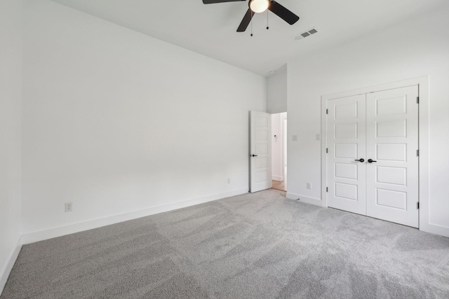 6002 Verde Way, Dallas, TX 75211 - unfurnished bedroom featuring carpet flooring, baseboards, a closet, and a ceiling fan