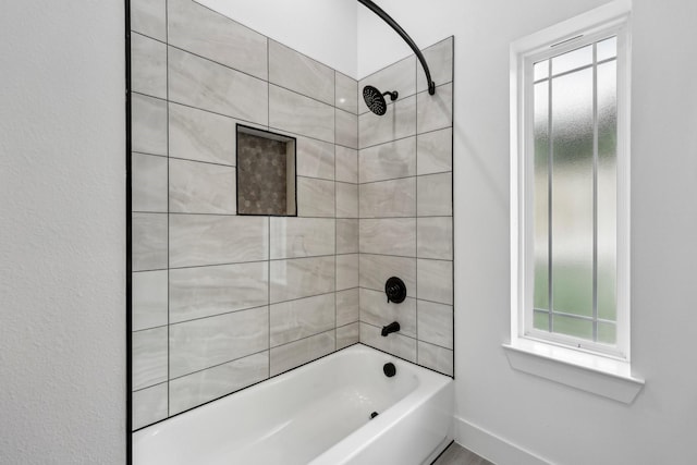 6002 Verde Way, Dallas, TX 75211 - bathroom with washtub / shower combination and baseboards