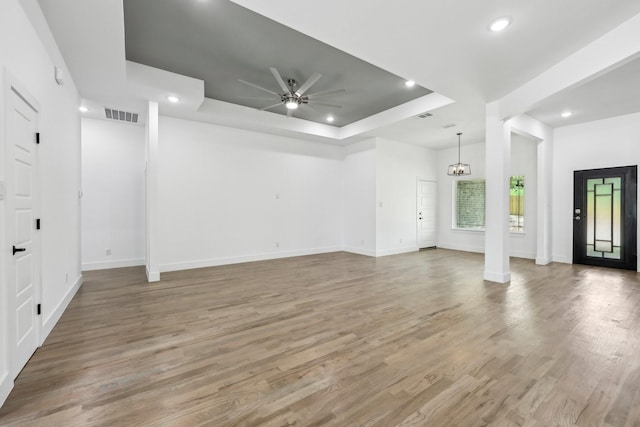 6002 Verde Way, Dallas, TX 75211 - unfurnished living room with recessed lighting, a ceiling fan, baseboards, light wood-type flooring, and a raised ceiling
