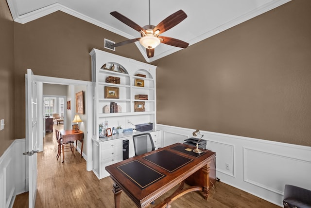 704 Longford Dr, Southlake, TX 76092 - office area with crown molding, ceiling fan, wood finished floors, and a wainscoted wall