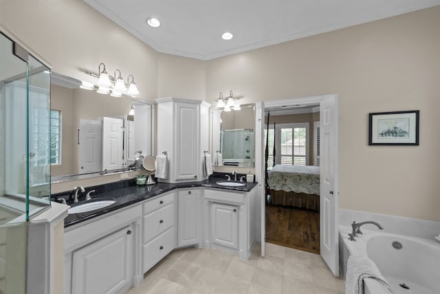 704 Longford Dr, Southlake, TX 76092 - ensuite bathroom featuring double vanity, a bath, a shower with shower door, crown molding, and tile patterned floors