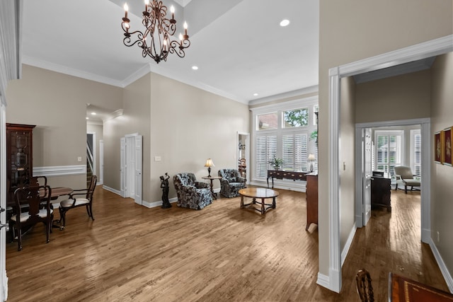 704 Longford Dr, Southlake, TX 76092 - living room featuring wood finished floors, recessed lighting, ornamental molding, baseboards, and a chandelier