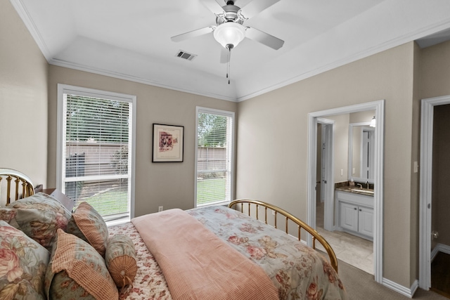 704 Longford Dr, Southlake, TX 76092 - bedroom with a sink, light carpet, a tray ceiling, ensuite bathroom, and crown molding