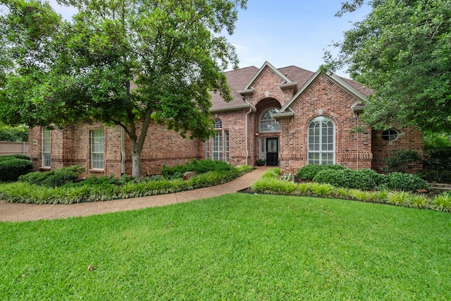 704 Longford Dr, Southlake, TX 76092 - view of front of home with a front yard and brick siding