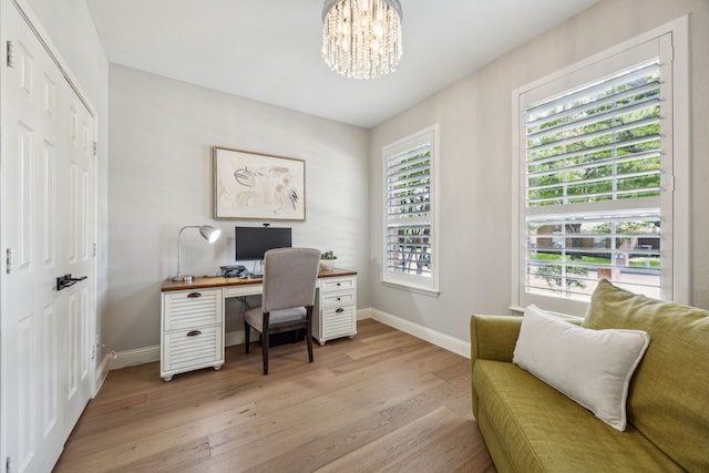 406 Misty Meadow Dr, Allen, TX 75013 - office with baseboards, light wood-style flooring, and a chandelier