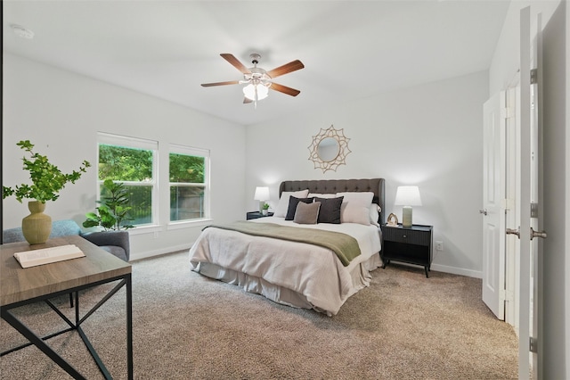 2101 Chebi Ln, Denton, TX 76209 - carpeted bedroom featuring baseboards and ceiling fan