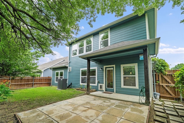 2101 Chebi Ln, Denton, TX 76209 - rear view of property with a patio and a fenced backyard