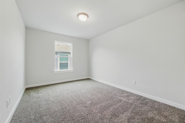 2101 Chebi Ln, Denton, TX 76209 - empty room featuring carpet and baseboards