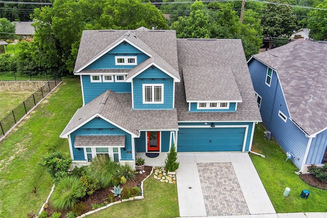 2101 Chebi Ln, Denton, TX 76209 - view of front of property with driveway, roof with shingles, and an attached garage