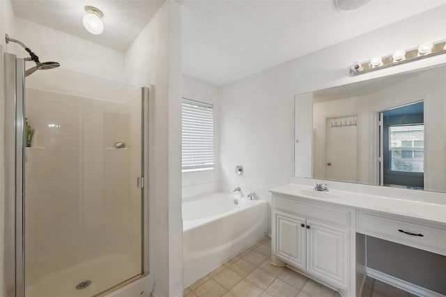 10700 Irish Glen Trl, Haslet, TX 76052 - full bathroom with a shower stall, vanity, a garden tub, and tile patterned floors
