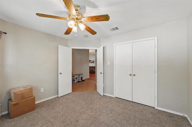 10700 Irish Glen Trl, Haslet, TX 76052 - unfurnished bedroom with carpet flooring, baseboards, a closet, and ceiling fan