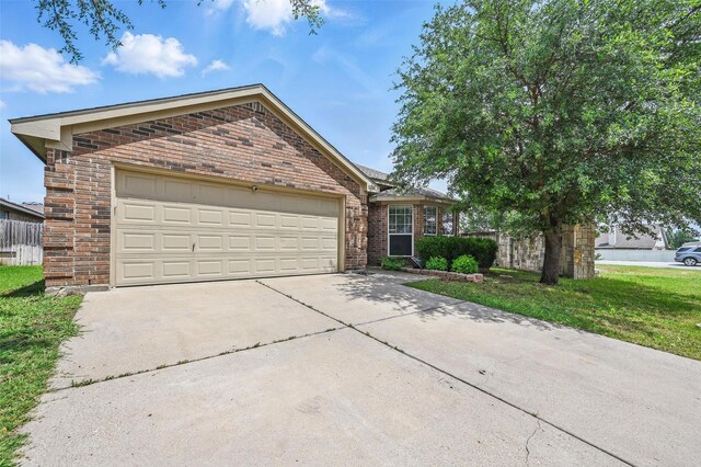 10700 Irish Glen Trl, Haslet, TX 76052 - single story home featuring brick siding, driveway, and an attached garage