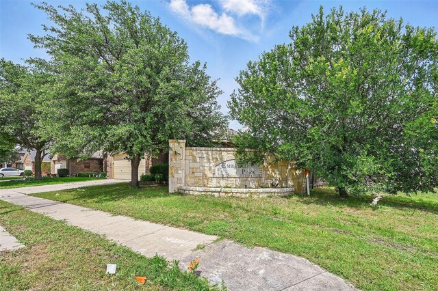 10700 Irish Glen Trl, Haslet, TX 76052 - community / neighborhood sign with concrete driveway, a yard, and an attached garage