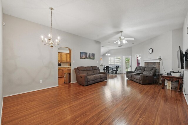 10700 Irish Glen Trl, Haslet, TX 76052 - living room featuring a chandelier, wood finished floors, a ceiling fan, and lofted ceiling