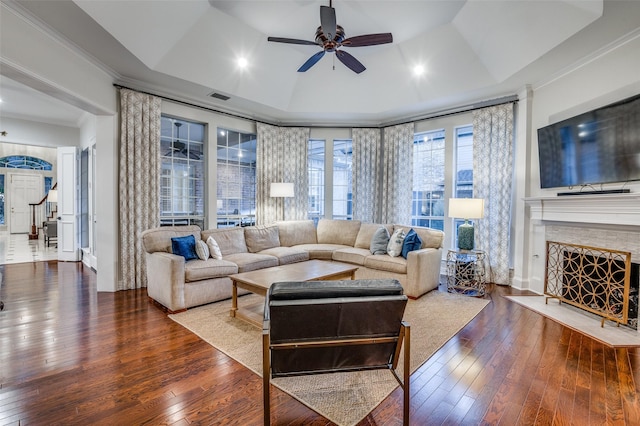 5932 Royal Palm Dr, Plano, TX 75093 - living room with a ceiling fan, wood-type flooring, a fireplace, ornamental molding, and recessed lighting